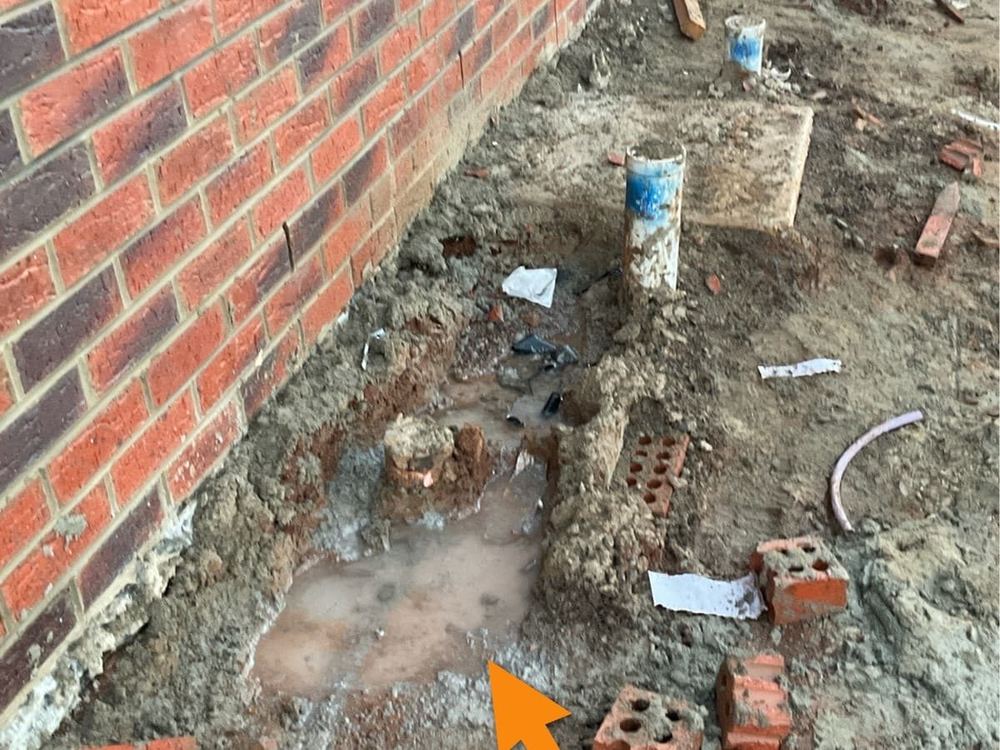 Debris at slab edge before plaster, Tarneit