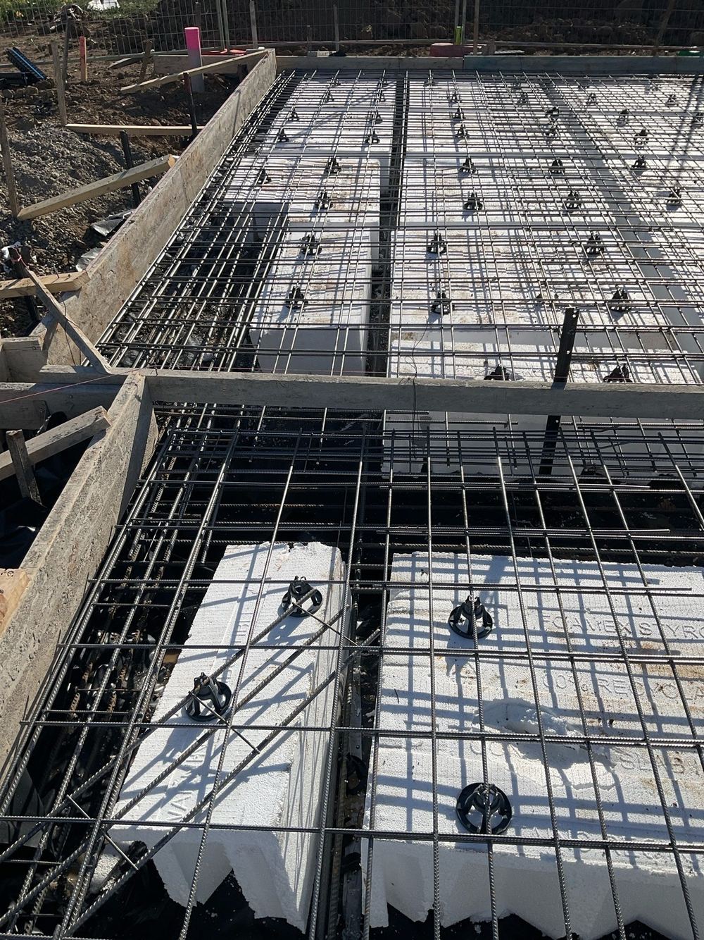 Beam width varying along its length where pods have shifted, found during a bored pier inspection in Tarneit