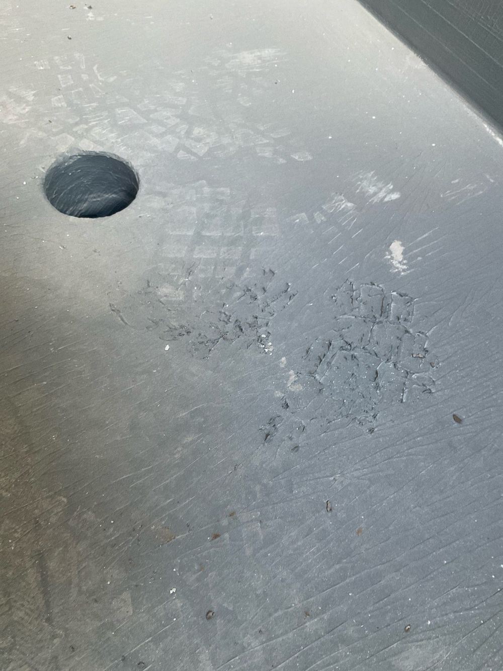 Waterproofing membrane damaged and needing repair before tiling starts, Tarneit