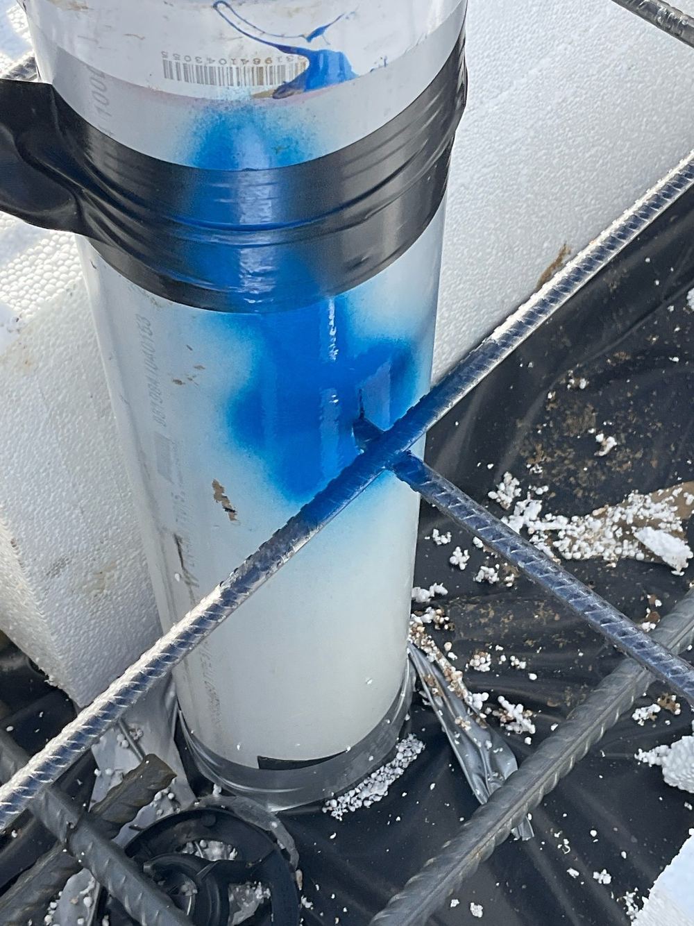 Slab reinforcement touching pipework, with none of the 25mm clearance required, found during a slab pre-pour inspection in Tarneit