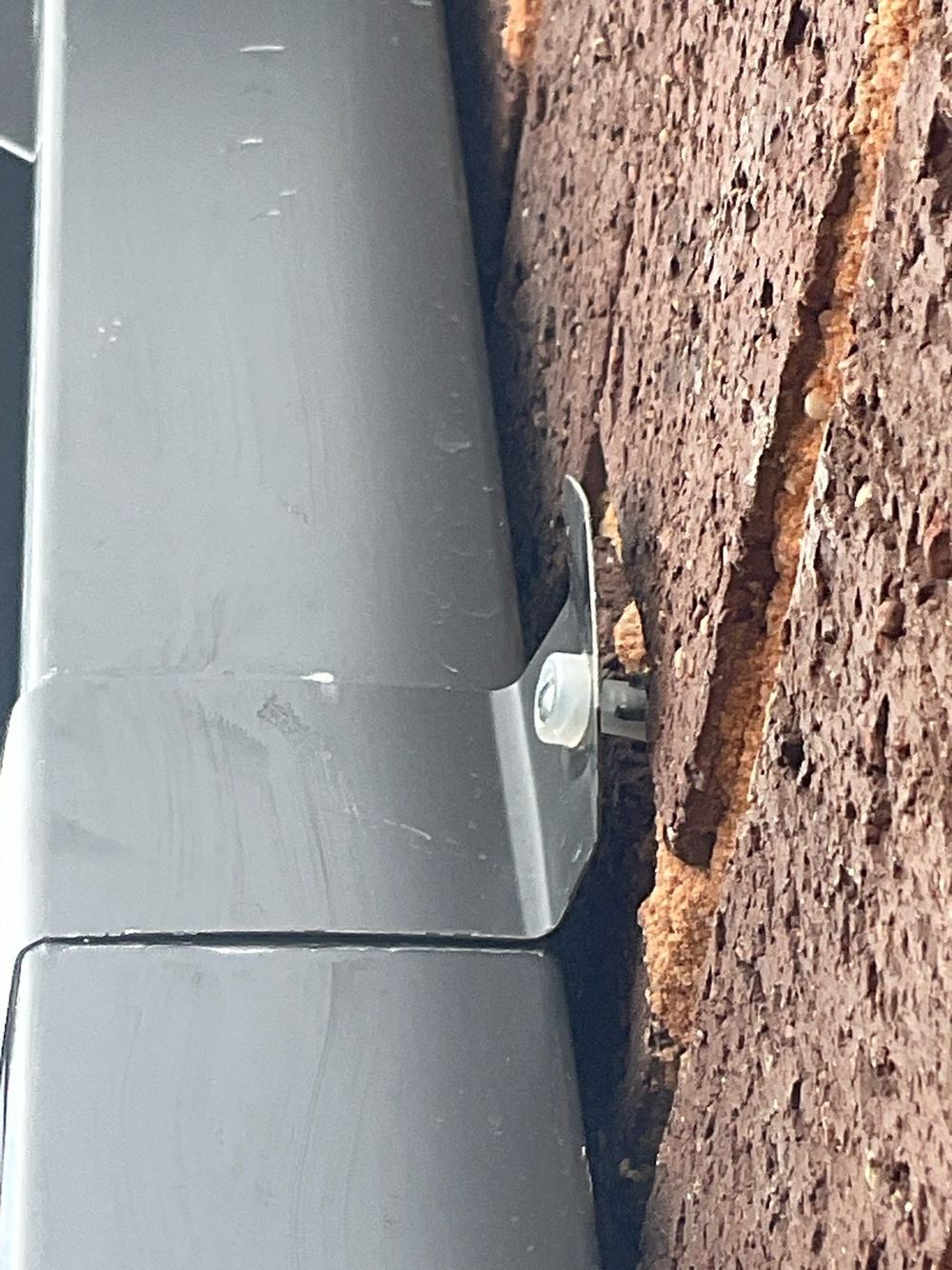 Fixing not properly secured back to the masonry wall, found during a defect investigation inspection in Tarneit