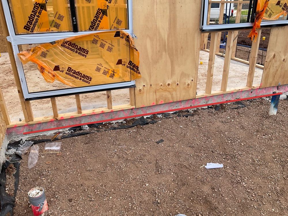 Frame overhanging the slab by more than the 10mm allowed, reducing its support, Tarneit